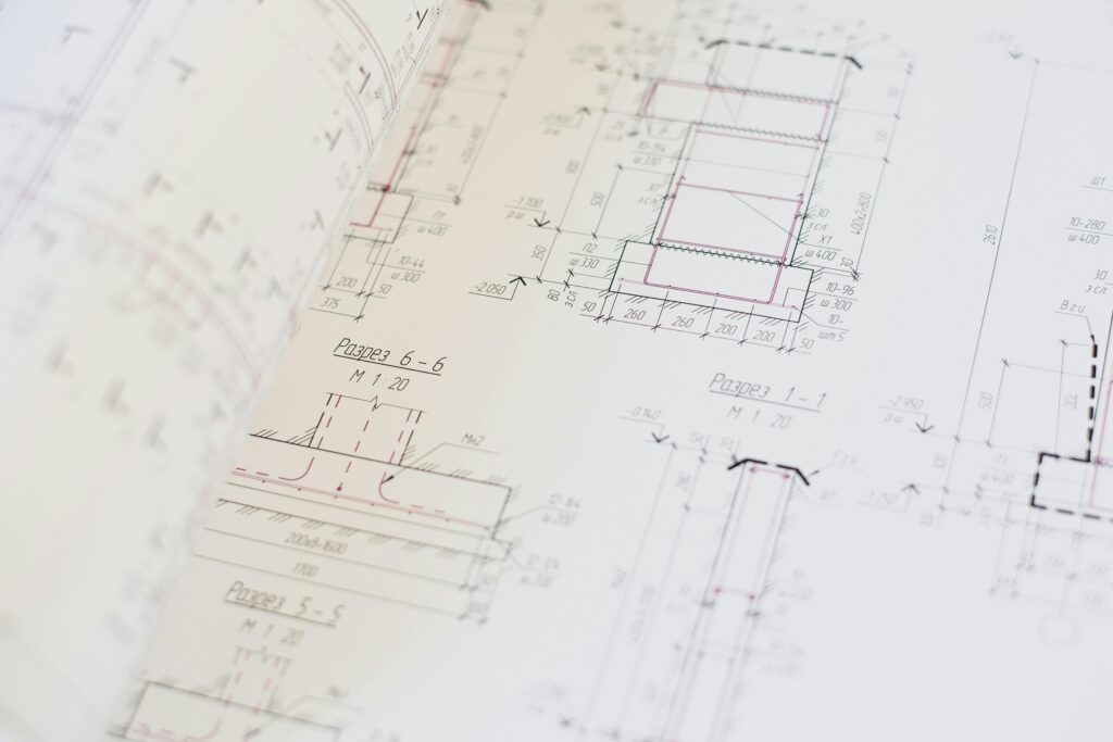 Close-up of a detailed architectural blueprint showcasing design and planning.